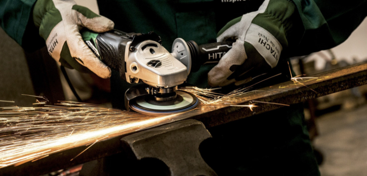 man grinding and reworking weld repairs